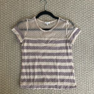 A Delia’s purple and white shirt-sleeve T-shirt
